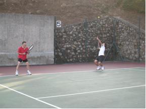 Mr Desmond HOU gave a big serve for the match.