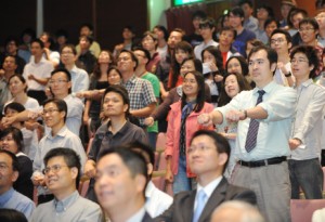 Participants at the public seminar enhance their understanding of statistical theories and applications through interactive games.